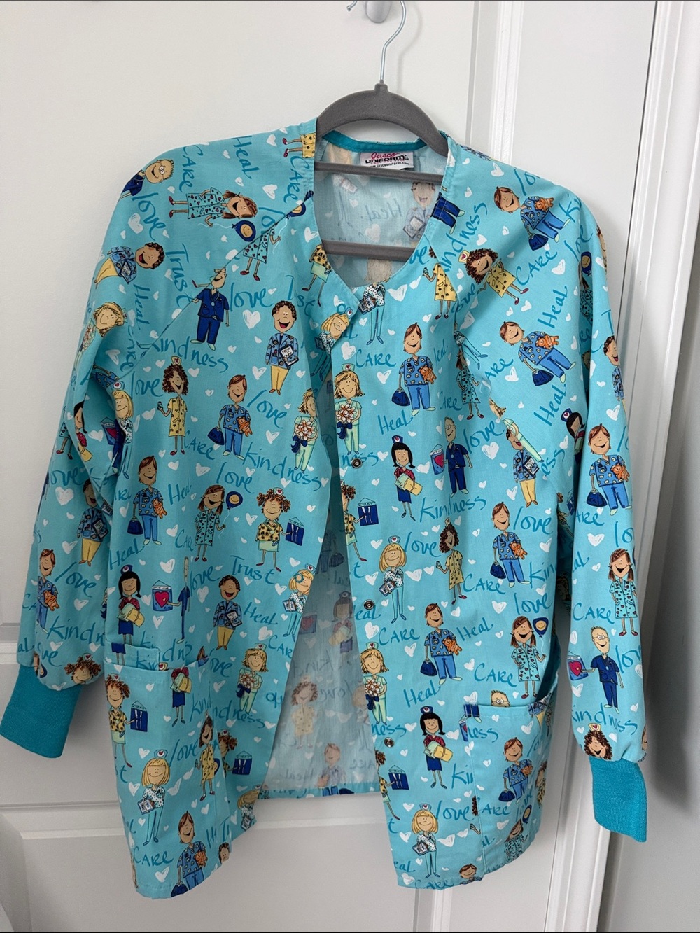 Aqua Medical Scrub Jacket — Illustrated Caregiver Print